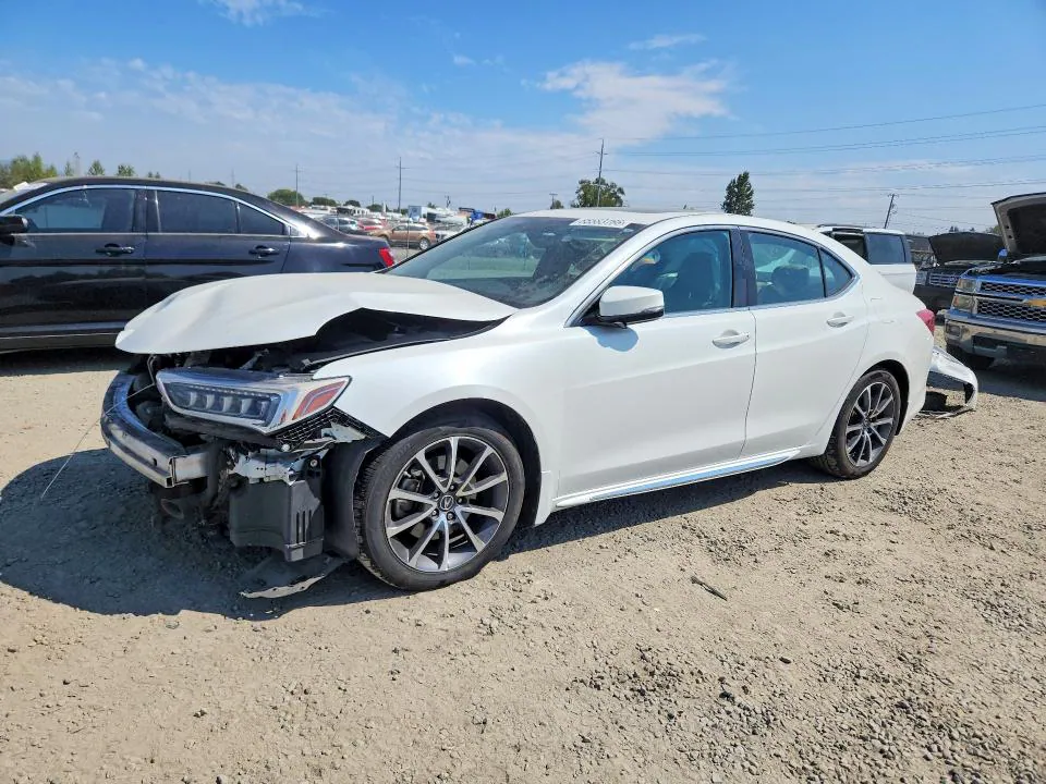 2018 Acura TLX VIN 19UUB3F5XJA004215 фото 1