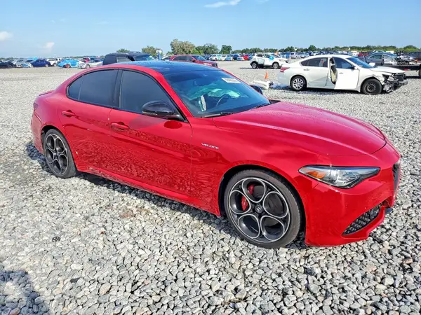 ZARFAMBN5P7669735 — 2023 Alfa Romeo Giulia, фото 4 с аукциона Copart 02.10.2026, Боковая часть