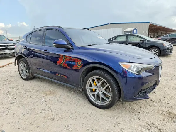 ZASFAKPN0J7B85834 — 2018 Alfa Romeo Stelvio, фото 4 с аукциона Copart, Задняя часть