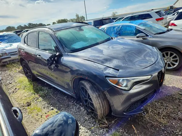 ZASPAKBN6M7D15650 — 2021 Alfa Romeo Stelvio, фото 4 с аукциона Copart, Повреждения со всех сторон