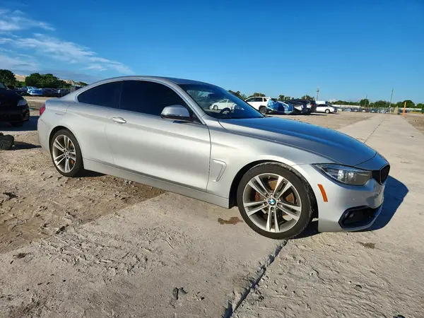 WBA4W3C50JAE99614 — 2018 BMW 4ER, фото 4 с аукциона Copart, Подтопление