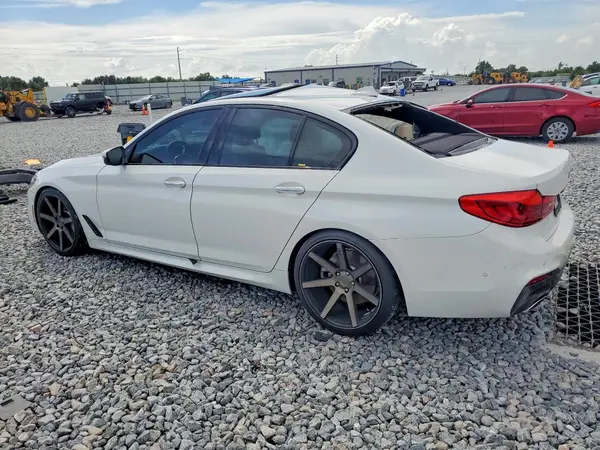 WBAJE5C30HG917304 — 2017 BMW 5ER, фото 2 с аукциона Copart, Боковая часть