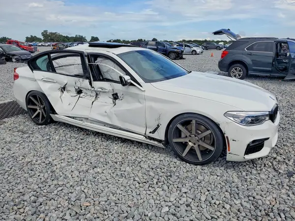 WBAJE5C30HG917304 — 2017 BMW 5ER, фото 4 с аукциона Copart, Боковая часть