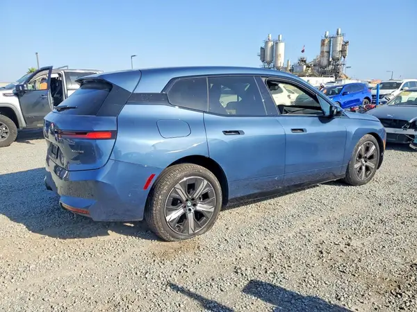 WB543CF00TCW38166 — 2026 BMW iX, фото 3 с аукциона Copart, Передняя часть