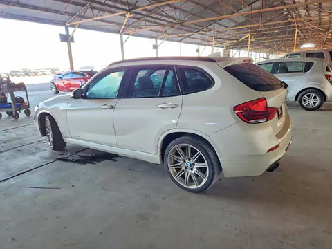 2015 BMW X1 VIN WBAVM5C5XFVV94491 фото 2