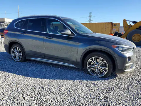 WBXHT3C32GP883511 — 2016 BMW X1, фото 4 с аукциона Copart 14.10.2026, Боковая часть