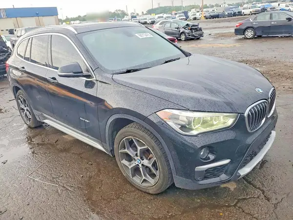 2016 BMW X1 VIN WBXHT3C38G5E48216 фото 4