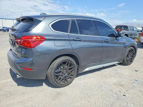 WBXHU7C38J5H43232 — 2018 BMW X1, фото 3 с аукциона Copart 29.09.2026, Мелкие вмятины и царапины