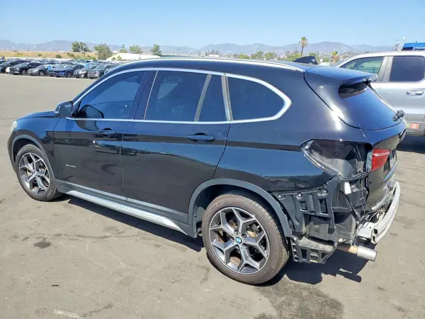WBXHT3Z38J4A66773 — 2018 BMW X1, фото 2 с аукциона Copart, Задняя часть