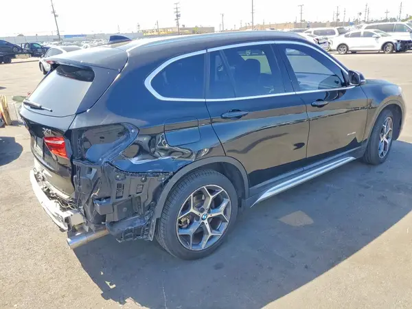 WBXHT3Z38J4A66773 — 2018 BMW X1, фото 3 с аукциона Copart, Задняя часть