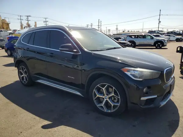 WBXHT3Z38J4A66773 — 2018 BMW X1, фото 4 с аукциона Copart, Задняя часть