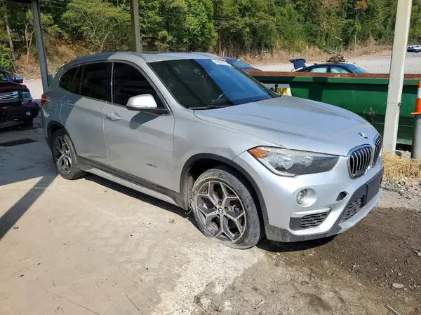 WBXHT3C36J5F91074 — 2018 BMW X1, фото 4 с аукциона Copart 13.10.2026, Механические повреждения