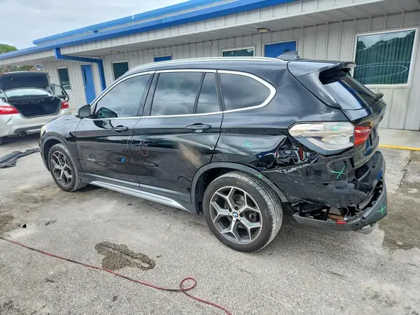 WBXHT3Z36J4A66609 — 2018 BMW X1, фото 2 с аукциона Copart, Задняя часть
