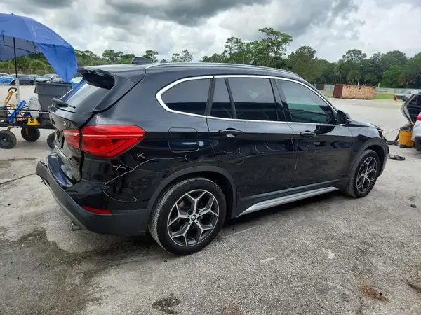 WBXHT3Z36J4A66609 — 2018 BMW X1, фото 3 с аукциона Copart, Задняя часть