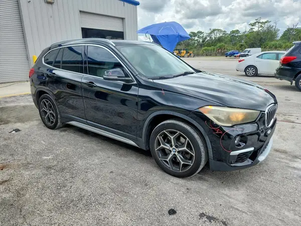 WBXHT3Z36J4A66609 — 2018 BMW X1, фото 4 с аукциона Copart, Задняя часть