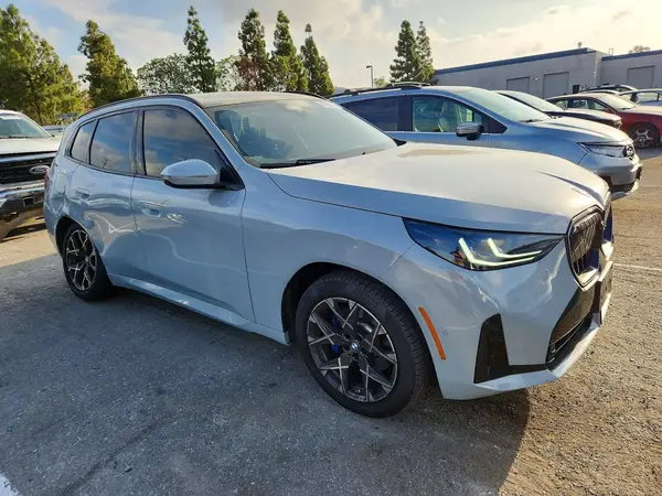 5UX53GP09S9031126 — 2025 BMW X3, фото 4 с аукциона Copart, Боковая часть