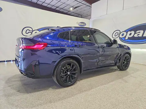 5UX33DT05S9019339 — 2025 BMW X4, фото 3 с аукциона Copart 29.09.2026, Боковая часть