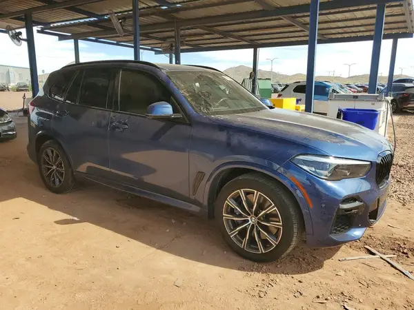5UXJU4C00N9J28834 — 2022 BMW X5, фото 4 с аукциона Copart 29.09.2026, Боковая часть