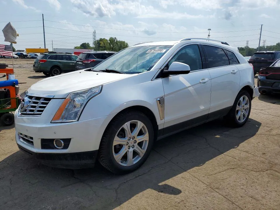 2015 CADILLAC SRX VIN 3GYFNGE39FS538599 фото 1