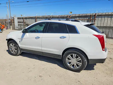 2016 Cadillac SRX VIN 3GYFNBE34GS501576 фото 2