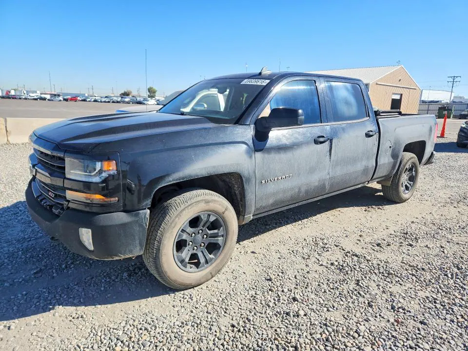 2018 Chevrolet Silverado VIN 1GCUKREC3JF147415 фото 1