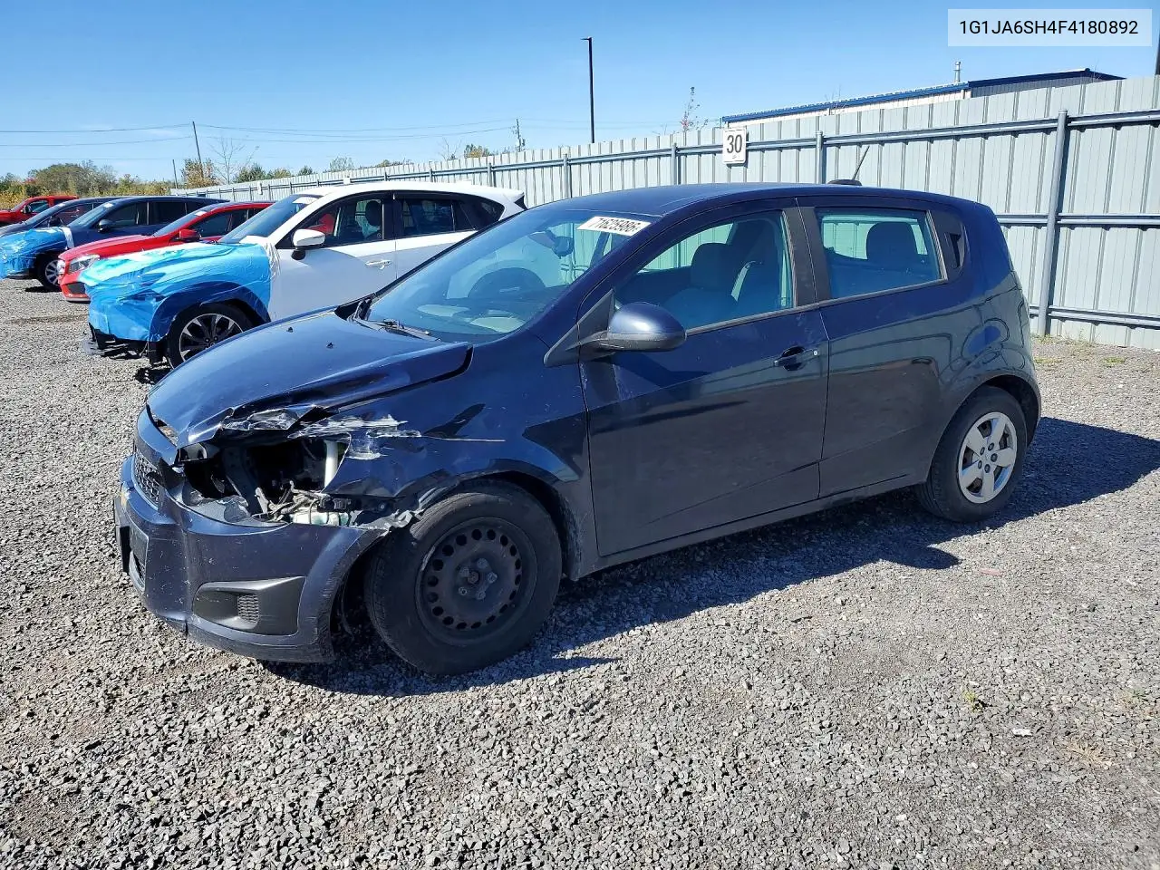 2015 Chevrolet Sonic Ls VIN 1G1JA6SH4F4180892 фото 1