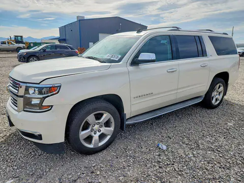 2015 Chevrolet Suburban VIN 1GNSKKKCXFR141854 фото 1