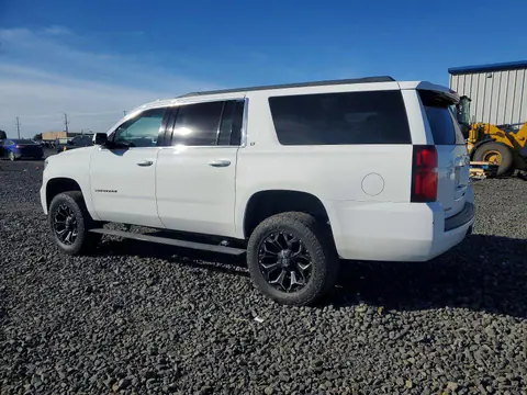 2015 Chevrolet Suburban VIN 1GNSKJKC8FR553328 фото 2