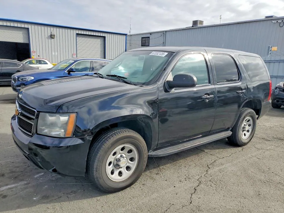 2014 Chevrolet Tahoe VIN 1GNSK2E01ER140852 фото 1