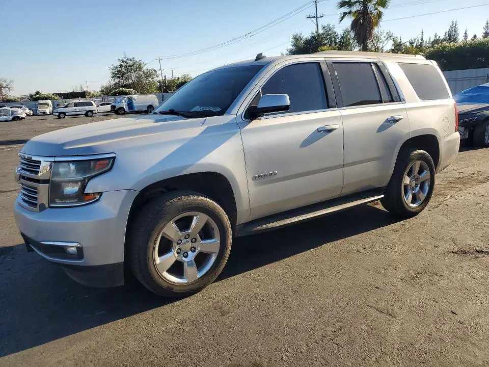 1GNSCBKC1FR163531 Chevrolet Tahoe 2015 — повреждение Боковая часть, фото до ремонта