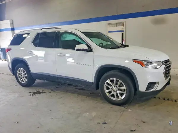 1GNEVGKW6JJ160999 — 2018 Chevrolet Traverse, фото 4 с аукциона Copart, Боковая часть