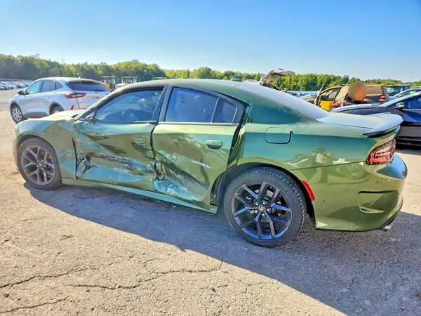 2C3CDXHG1PH595057 — 2023 Dodge Charger, фото 2 с аукциона Copart, Боковая часть