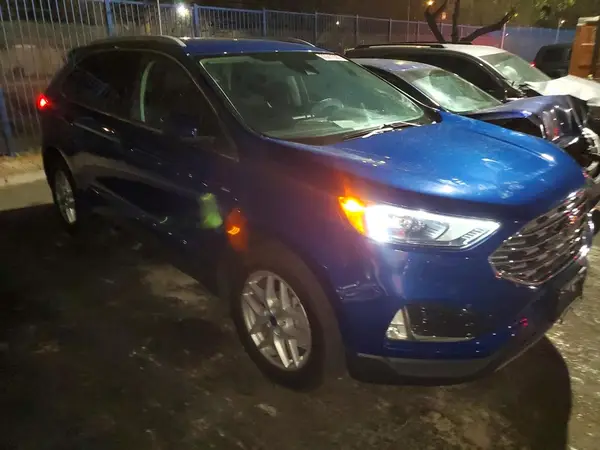 2FMPK4J9XNBB08639 — 2022 Ford EDGE, фото 4 с аукциона Copart, Мелкие вмятины и царапины