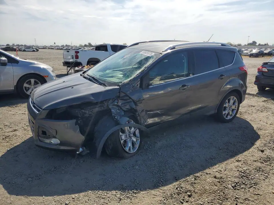 2015 Ford Escape VIN 1FMCU0JX7FUB49869 фото 1