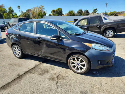 2015 Ford Fiesta VIN 3FADP4BJ4FM205472 фото 4