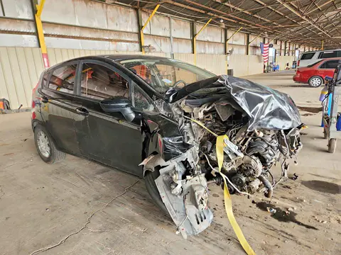 2017 Ford Fiesta VIN 3FADP4TJ1HM104374 фото 4
