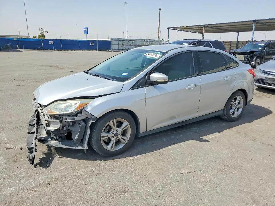 2014 Ford Focus VIN 1FADP3F27EL110305 фото 1
