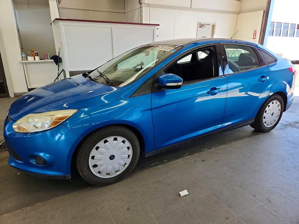 2014 Ford Focus VIN 1FADP3F22EL219741 фото 1