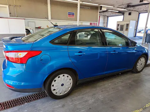 2014 Ford Focus VIN 1FADP3F22EL219741 фото 3