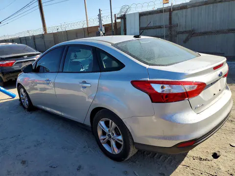 2014 Ford Focus VIN 1FADP3F29EL144309 фото 2