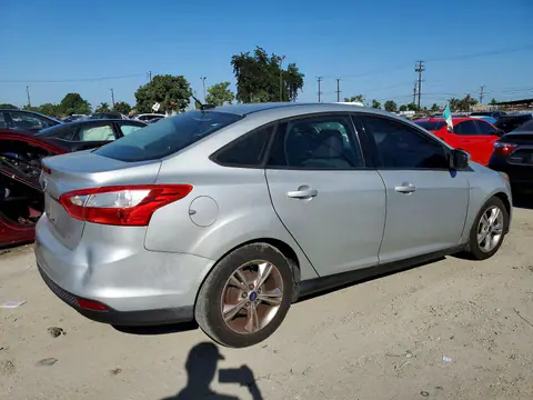 2014 Ford Focus VIN 1FADP3F29EL144309 фото 3