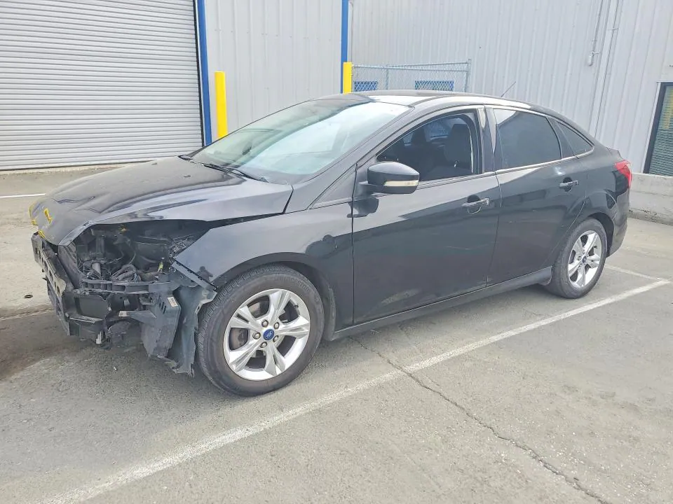 2014 Ford Focus VIN 1FADP3F21EL118416 фото 1