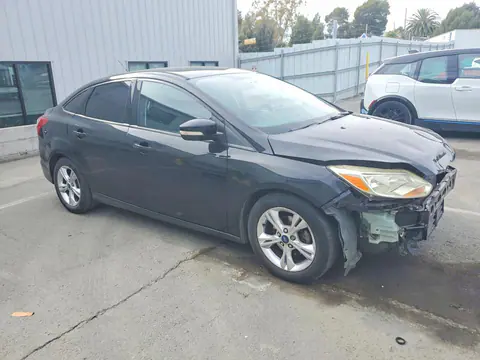 2014 Ford Focus VIN 1FADP3F21EL118416 фото 4
