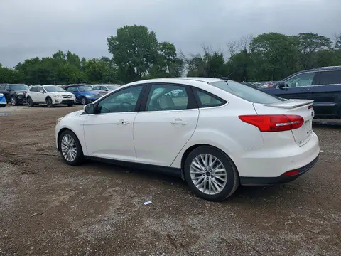 2015 Ford Focus VIN 1FADP3J28FL299913 фото 2