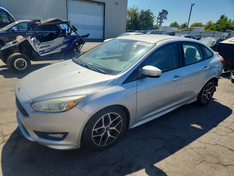 2015 Ford Focus VIN 1FADP3F20FL268017 фото 1
