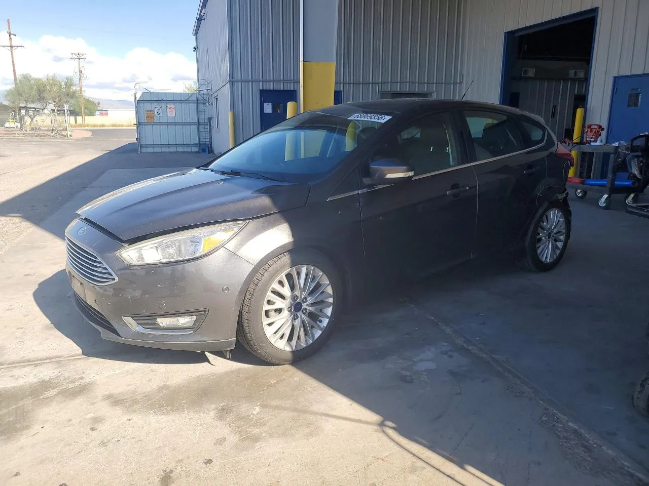 2015 Ford Focus Titanium VIN 1FADP3N29FL380686 фото 1