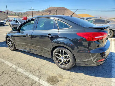 2015 Ford Focus VIN 1FADP3F27FL248993 фото 2