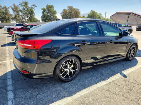 2015 Ford Focus VIN 1FADP3F27FL248993 фото 3