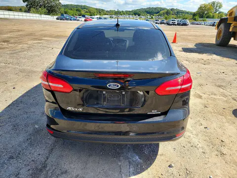 2015 Ford Focus 4D VIN 1FADP3F29FL253452 фото 6