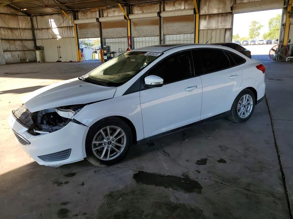 2016 Ford Focus VIN 1FADP3F24GL297960 фото 1